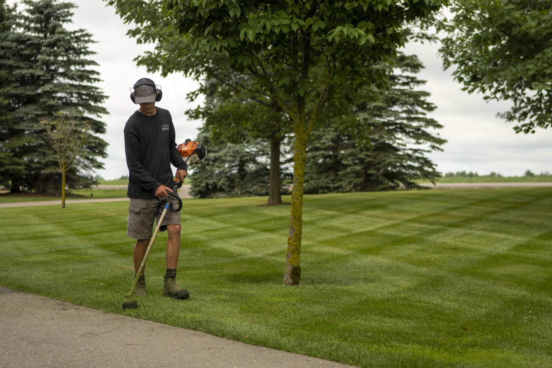 A team member helping out with DIY lawncare.