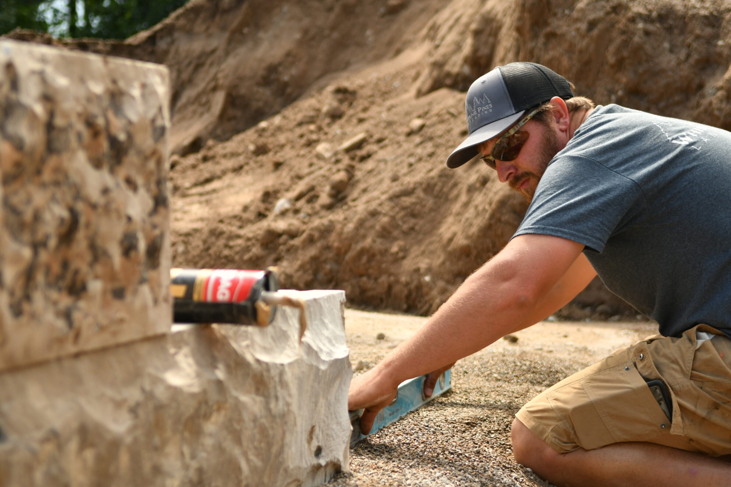 A team member helping with landscaping in Orangeville.