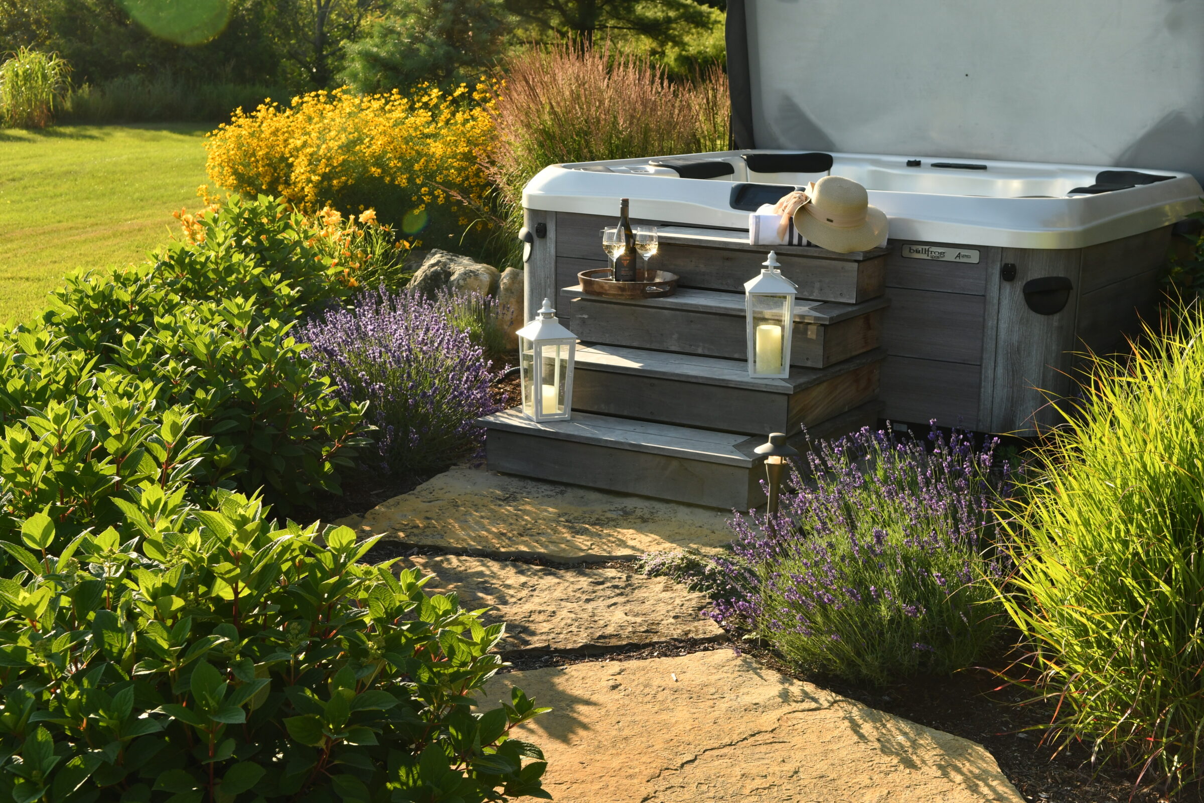 A serene garden setting with a hot tub, surrounded by vibrant plants and lanterns, creating a relaxing atmosphere.